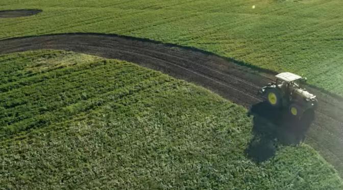 Field with tractor.