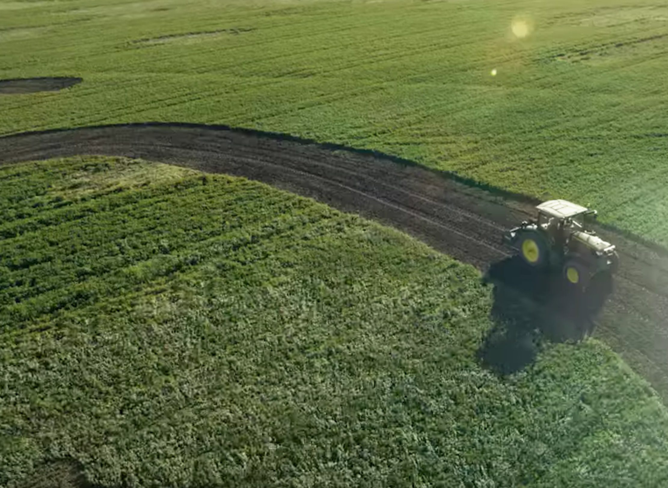 Field with tractor.