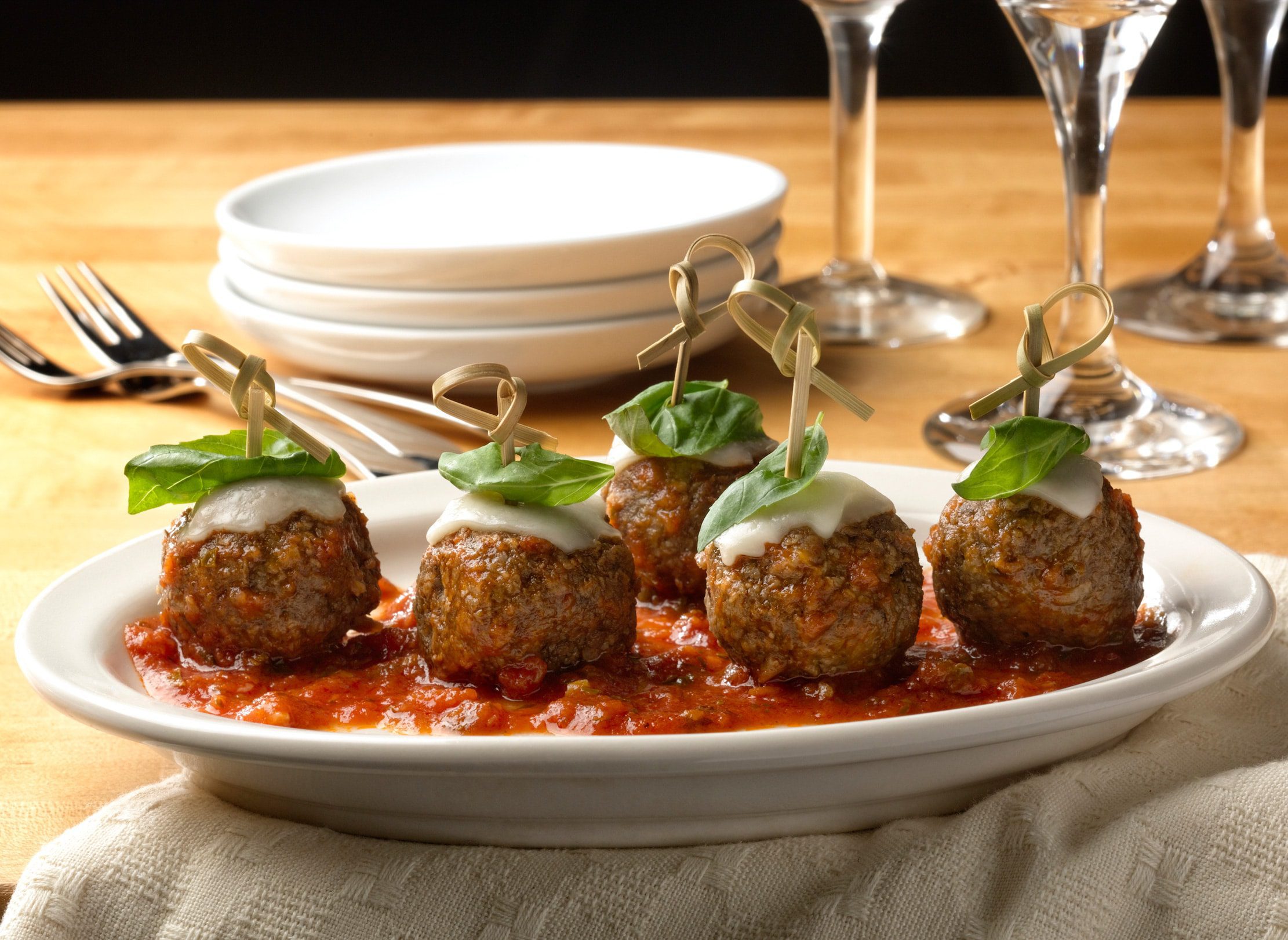 Dish of garnished plant-based Lightlife Meatballs.