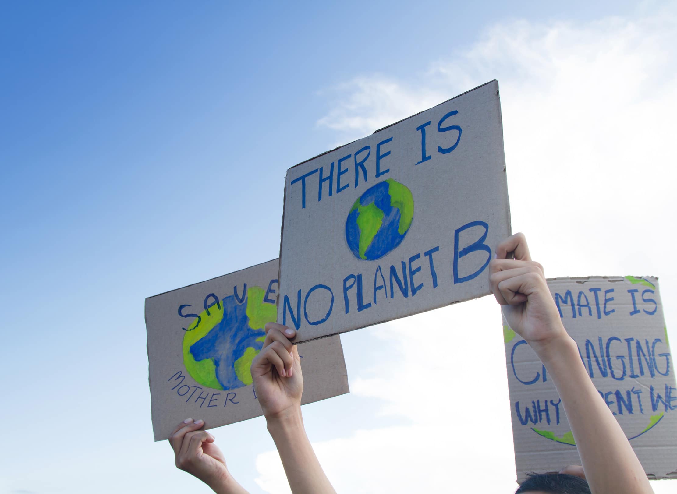 Signs with climate change slogans