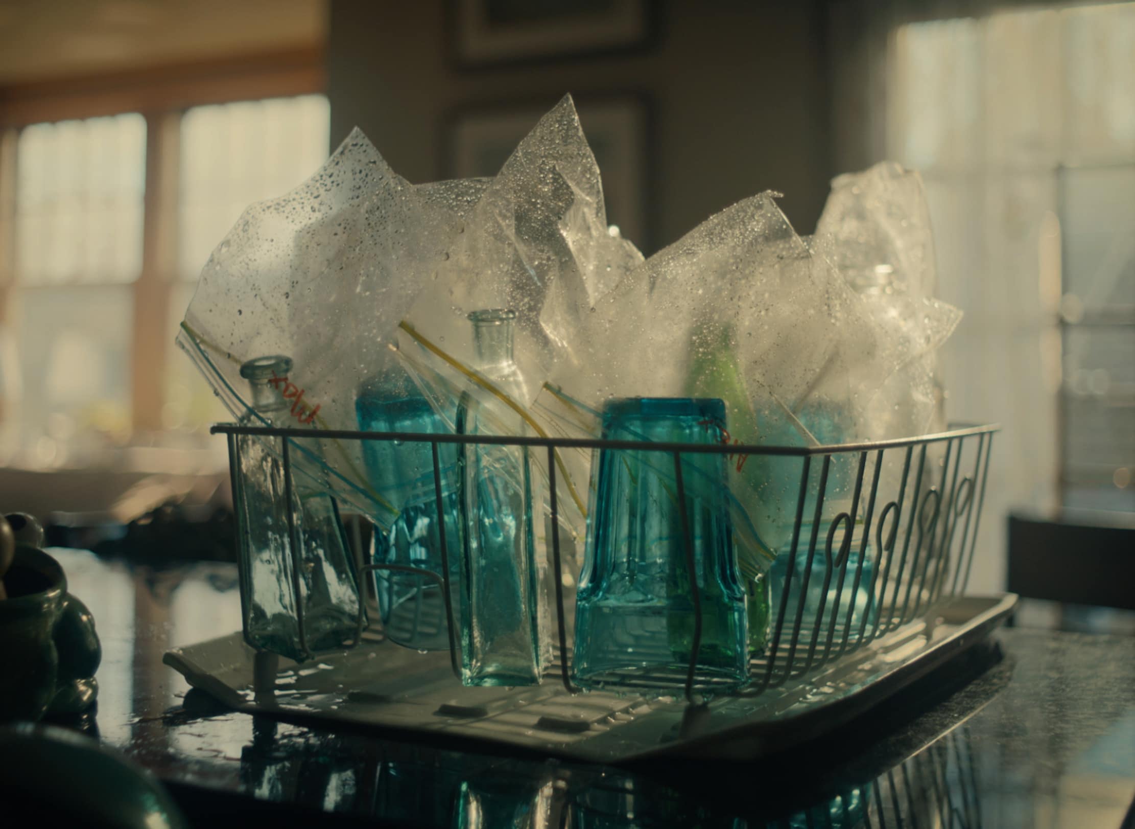 Washed plastic bags drying in kitchen from 2020 Super Bowl Ad.