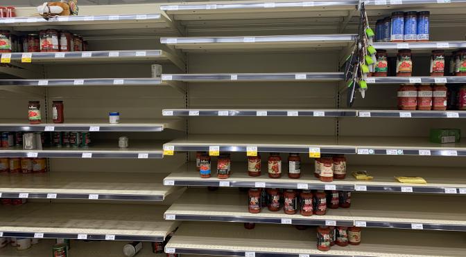 Empty grocery shelves during the COVID-19 pandemic.