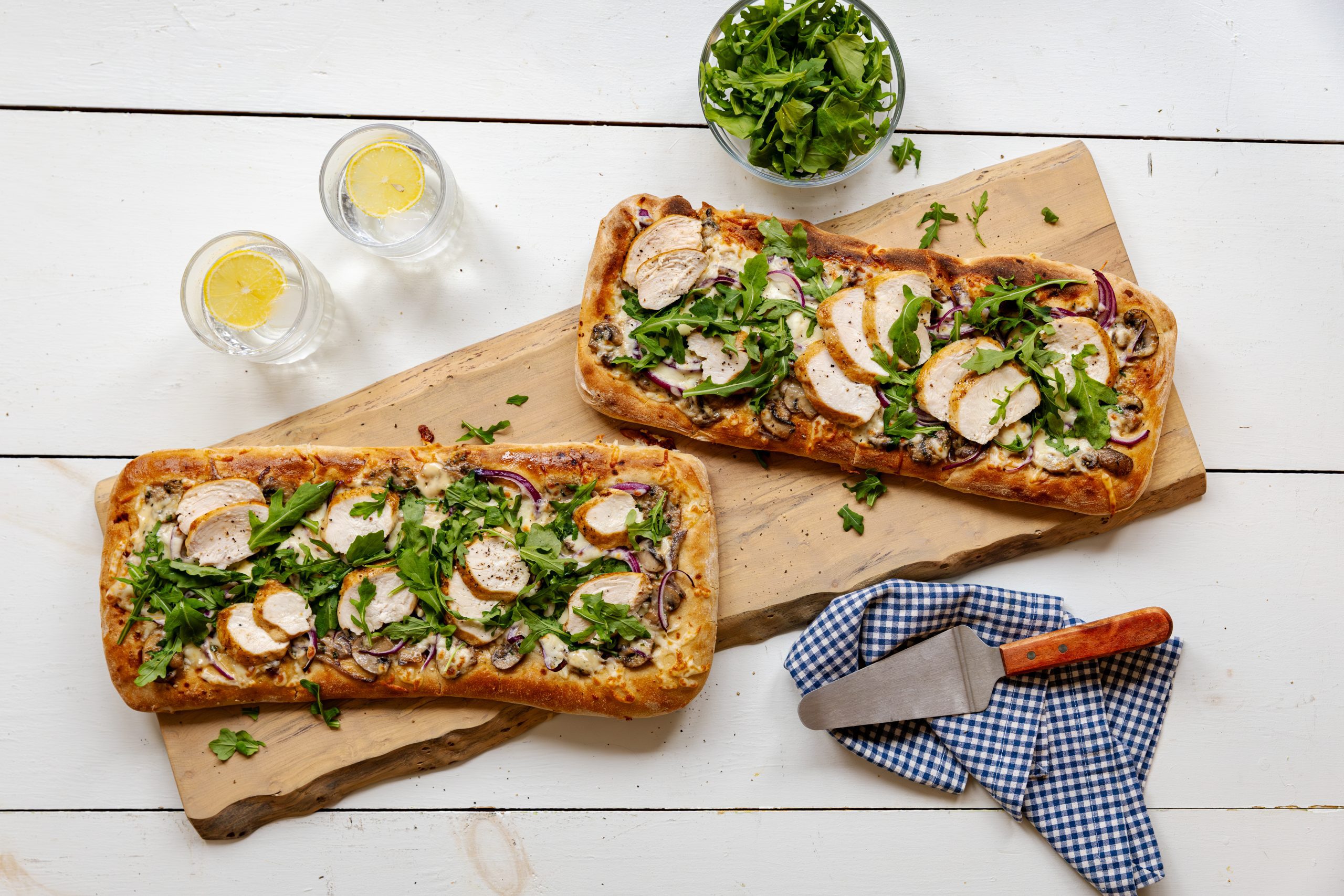 Chicken mushroom flatbread, served on wood board