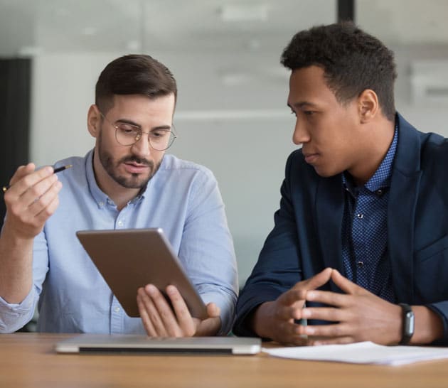 MLF-Looking-At-Tablet-Business