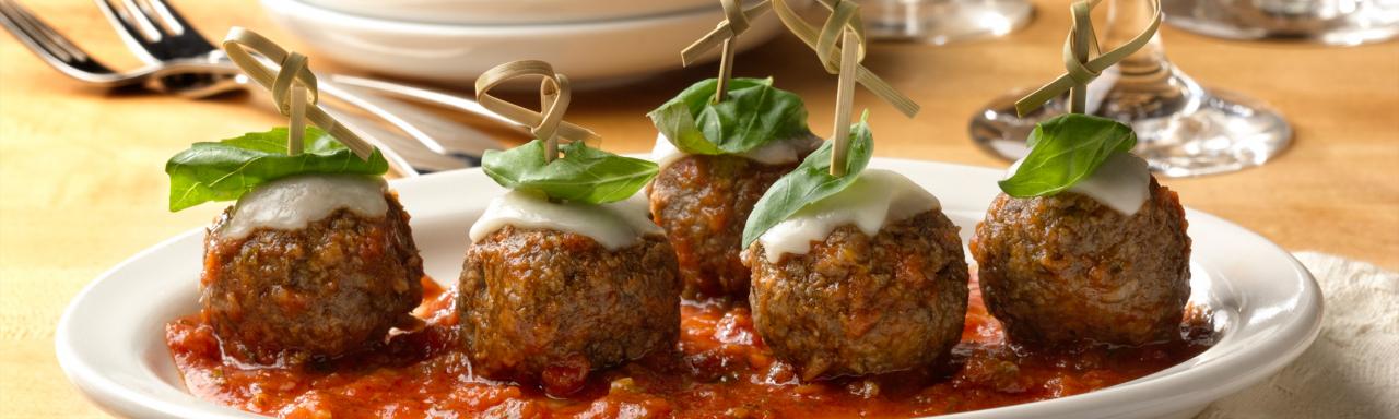 Dish of garnished plant-based Lightlife Meatballs.