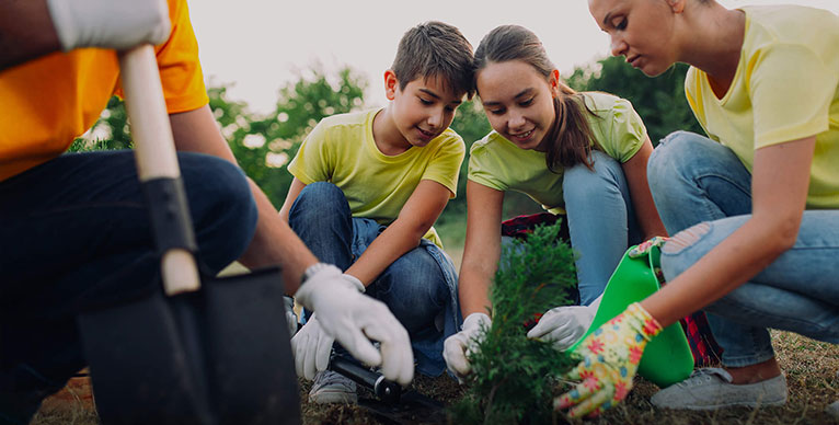 Image Better Communities - family planting vegetable