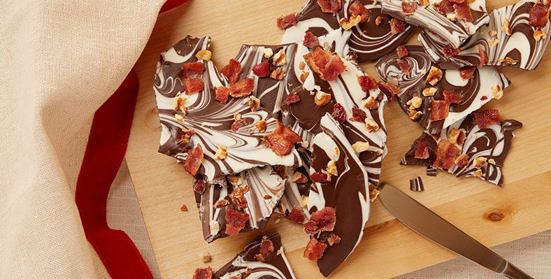 Sweet and savoury marbled Bacon and walnut bark dessert.