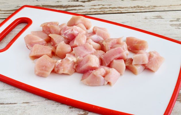 Raw chicken on a cutting board