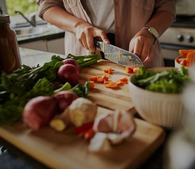 Cutting vegetables on a cutting board