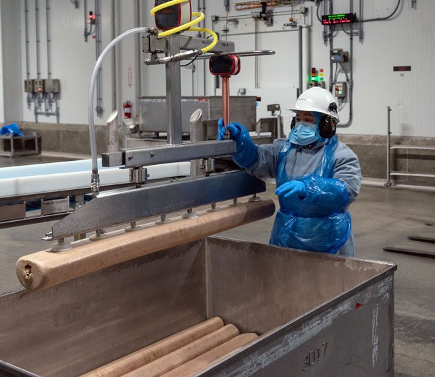 Making hot dogs in Hamilton production plant