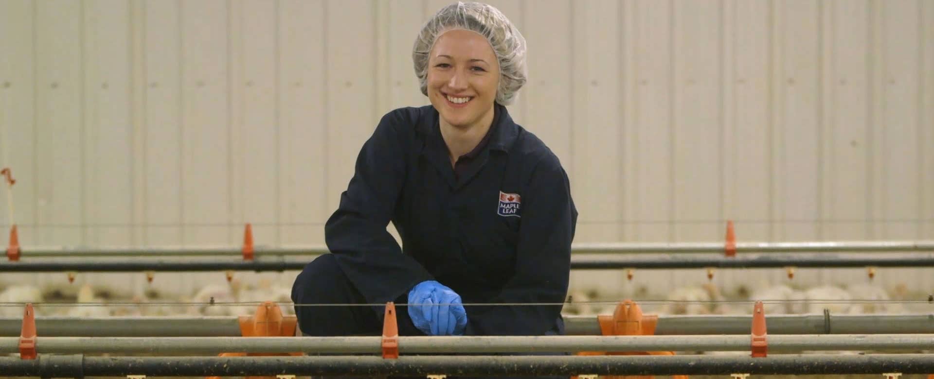 Kathleen Long, VP of Animal Care inside a poultry barn