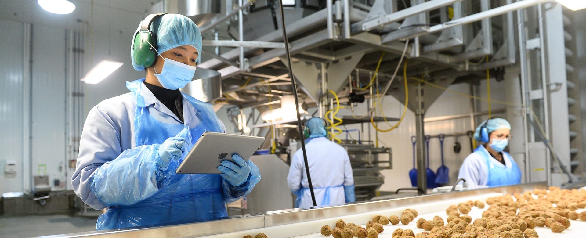 Supervisor with tablet at Brampton manufacturing plant