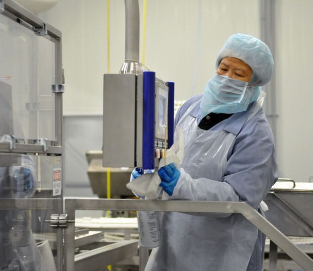 Cleaning equipment at a Maple Leaf Foods plant