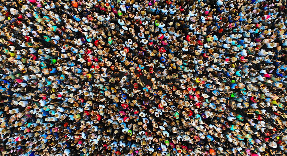 large group of people, small heads to signify many different people