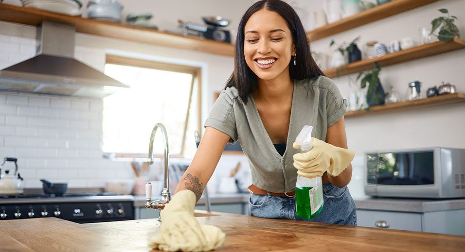 woman cleaning in a kitchen
